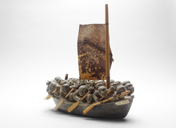 The Migration by Puvirnituq carver and printmaker Joe Talirunili. Talirunili's carving depicts an event when the boat on which he was travelling was nearly trapped by crushing ice in Hudson Bay. (PHOTO/ART GALLERY OF ONTARIO)