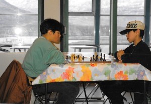 Kids play chess in a Nuuk recreation centre, 1995. (PHOTO BY JANE GEORGE)