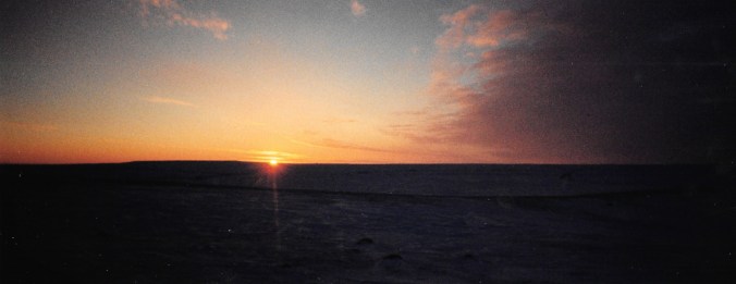 The sun rises over the horizon in mid-January, 1997. (PHOTO BY JANE GEORGE)