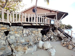 Waves pounded this seaside restaurant in 2011, nearly dragging it down to the beach. (PHOTO BY JANE GEORGE)